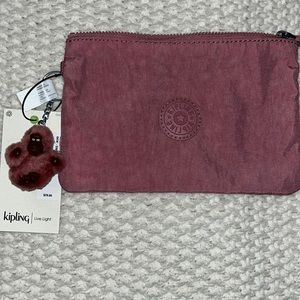 NWT: Kipling sweet pink color pouch